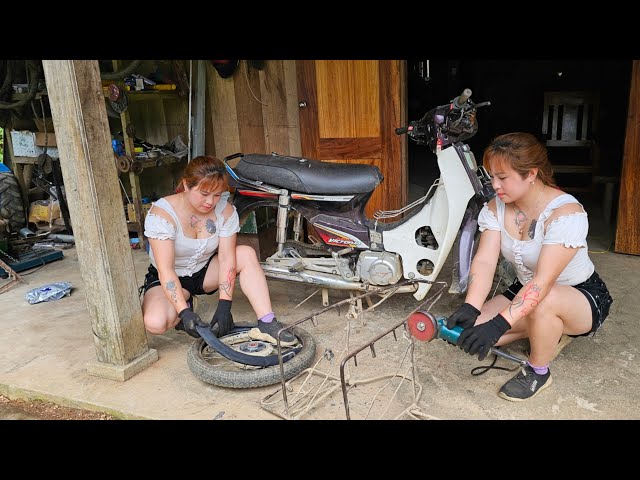 The girl mechanic helps people in the village repair motorbikes class=