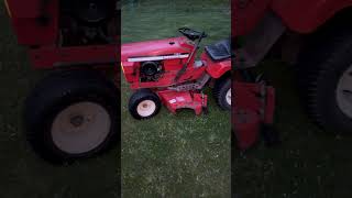 Allis Chalmers 712H out with the pull type spreader! #allischalmers #yardwork