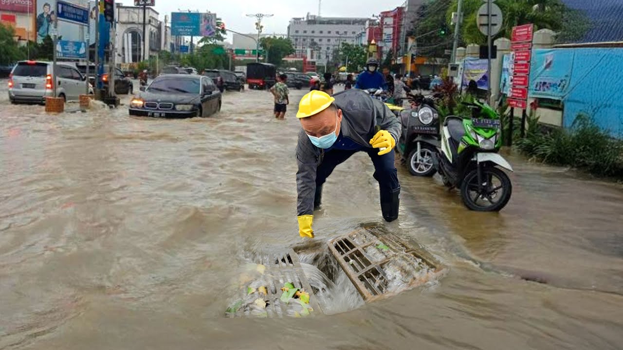 Clearing Massive Road Floods During the Storm Draining a Flooded Street ...