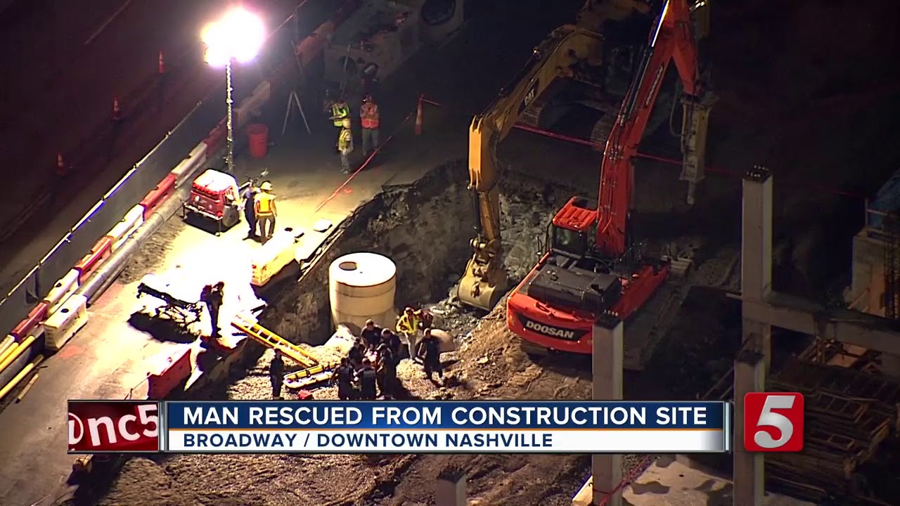 Nashville Worker Rescued After Falling Into Hole - YouTube