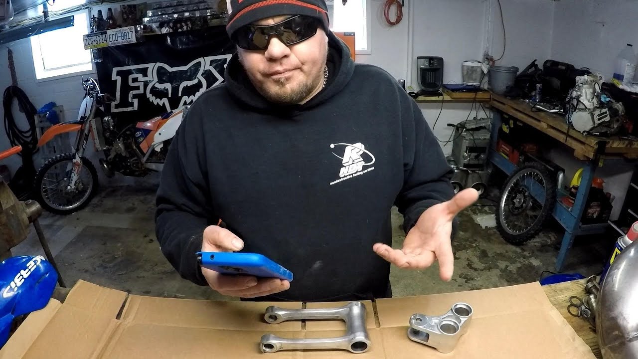 Replacing linkage bearings on a 08 YZ 250 with a homemade bearing tool
