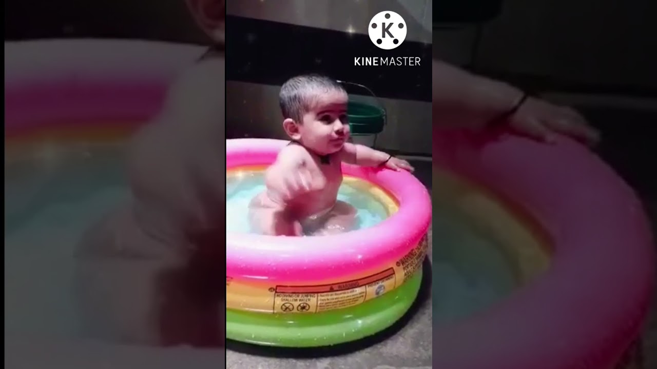 Baby girl bathing|