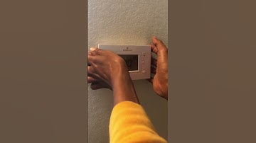 How to replace batteries on EMERSON THERMOSTAT.