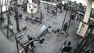 Man Slips While Trying to Sit on Inclined Gym Bench