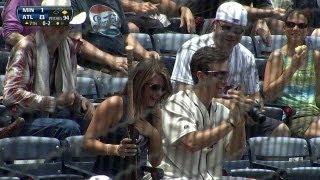 MIN@ATL: Fan winds up with bat in stands in seventh screenshot 4