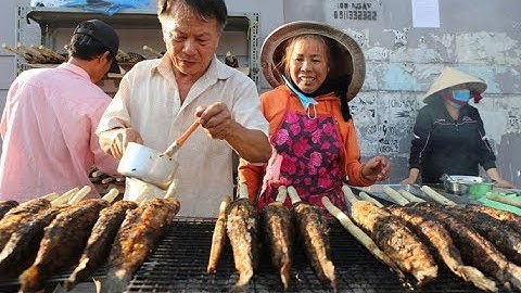 Chủ quán nướng gần 3.500 cá lóc bán ngày vía Thần Tài | NLĐTV