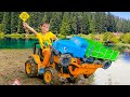 Damian and Darius ride Tractors in the mud learning traffic rules for kids