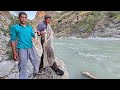 Nomadic men go fishing in a huge River (Iran 2023)