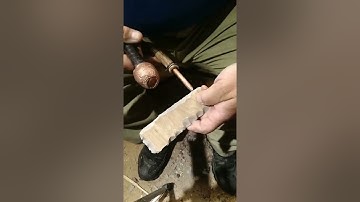 Flintknapping floor tile at night