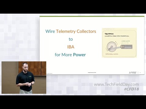 Screenshot from the video with an image of a man speaking and a graphic message reading “Wire Telemetry Collectors to IBA for More Power” and a diagram.