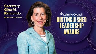 Commerce Secretary Gina Raimondo accepts Distinguished Leadership Award, introduced by John Rogers