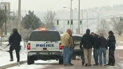 Colorado shooting witness saw officer 'go down'