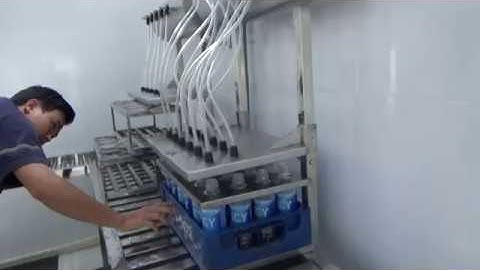 Bàn chiết rót chai nước bán tự động