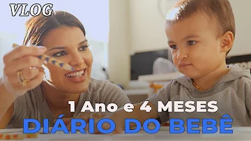 O que um bebê de 1 e 4 meses faz?
