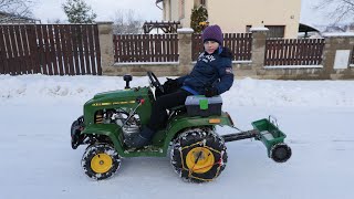 John Deere 21.1.2023 zimná údržba ulice