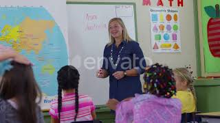 Students raise hands in school classroom | Stock Footage - Envato elements Students raise hands in school classroom | Stock Footage - Envato elements