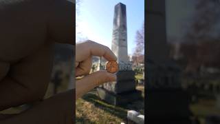 Putting A Penny On John Wilkes Booth's Grave