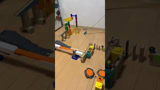 Marble chain reaction on a table #marblerun #rubegoldberg #asmr #dominos #satisfying #shortsfeed