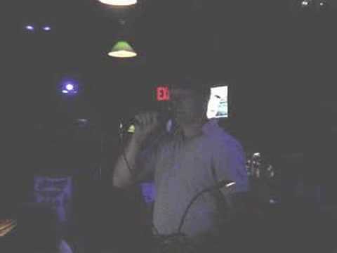 Jeremy Walker singing at a Karaoke Bar