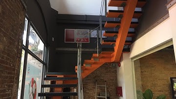 Kho Tư liệu Xây dựng - Cầu thang xương cá | Cầu thang đẹp | Cầu thang khung bê tông mặt ốp sắt