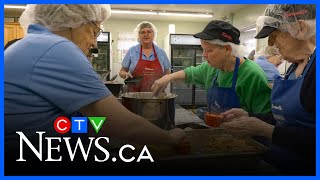 Volunteers serve 500,000th meal
