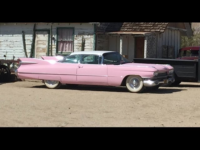 1959 Pink Cadillac Coupe DeVille Fins on the side of the road in