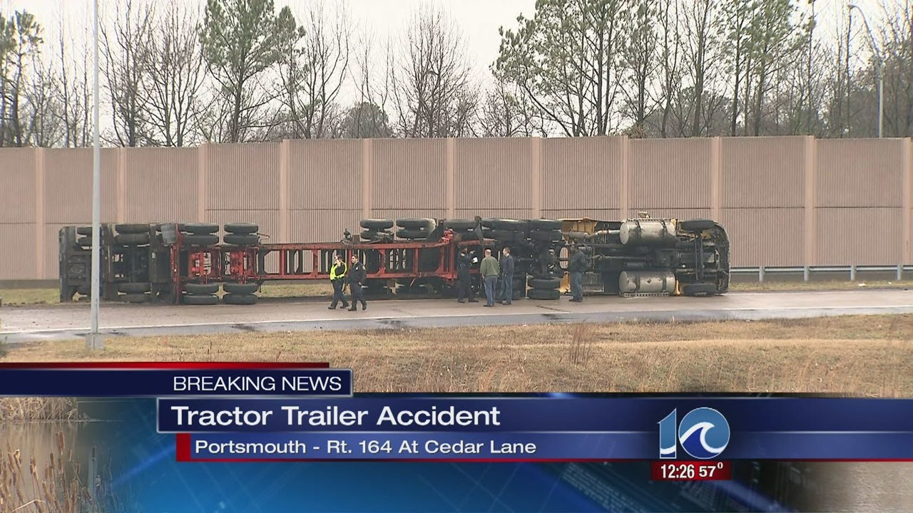 Tractor trailer tips over in Portsmouth - YouTube