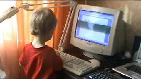 Andrej writing the word "NotebooK"