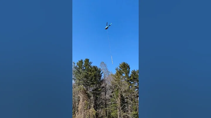 Getting the power grid back up after Hurricane Helene using helicopters in Mitchell Co NC