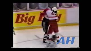 NHL Sep. 21, 1994 Darren McCarty,DET v Cam Russell,CHI Detroit Red Wings Chicago Blackhawks