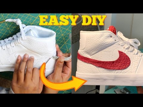 painting nike swoosh on shoes