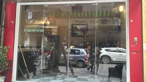 MẪU CỬA KÍNH CƯỜNG LỰC MỞ LÙA NHÀ MẶT TIỀN KINH DOANH