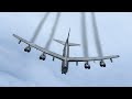 Old Massive US B-52 Leaves Smoke Trails from Jet Engines During Air Refueling