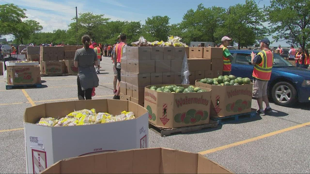 Greater Cleveland Food Bank holding drive-thru food distribution at Muni Lot in Cleveland