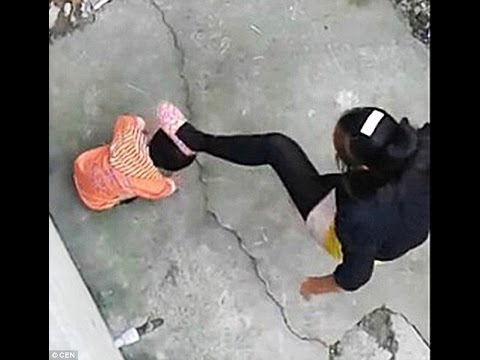 Shocking moment Chinese stepmother whips and kicks a toddler for wetting herself