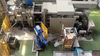 Die Casting Automation Cell - TBC 850 Ton PDC Machine with Robot Sprayer, Extractor & Trimming Press