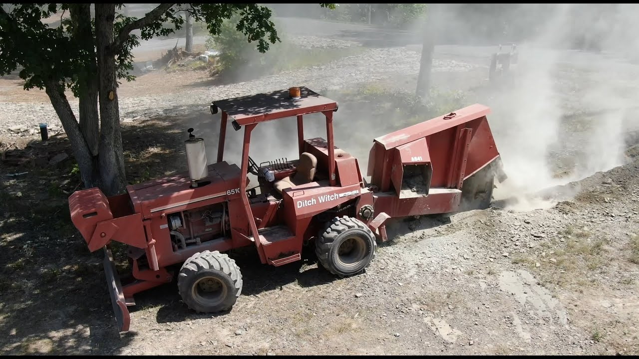 Sawing rock for an underground electric service
