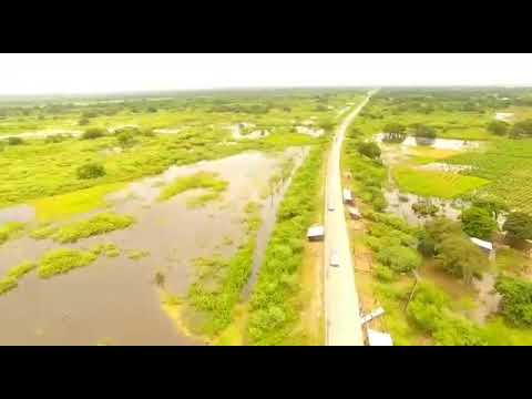 Acceso a Puerto Pilcomayo rodeado de agua por la crecida del río Paraguay