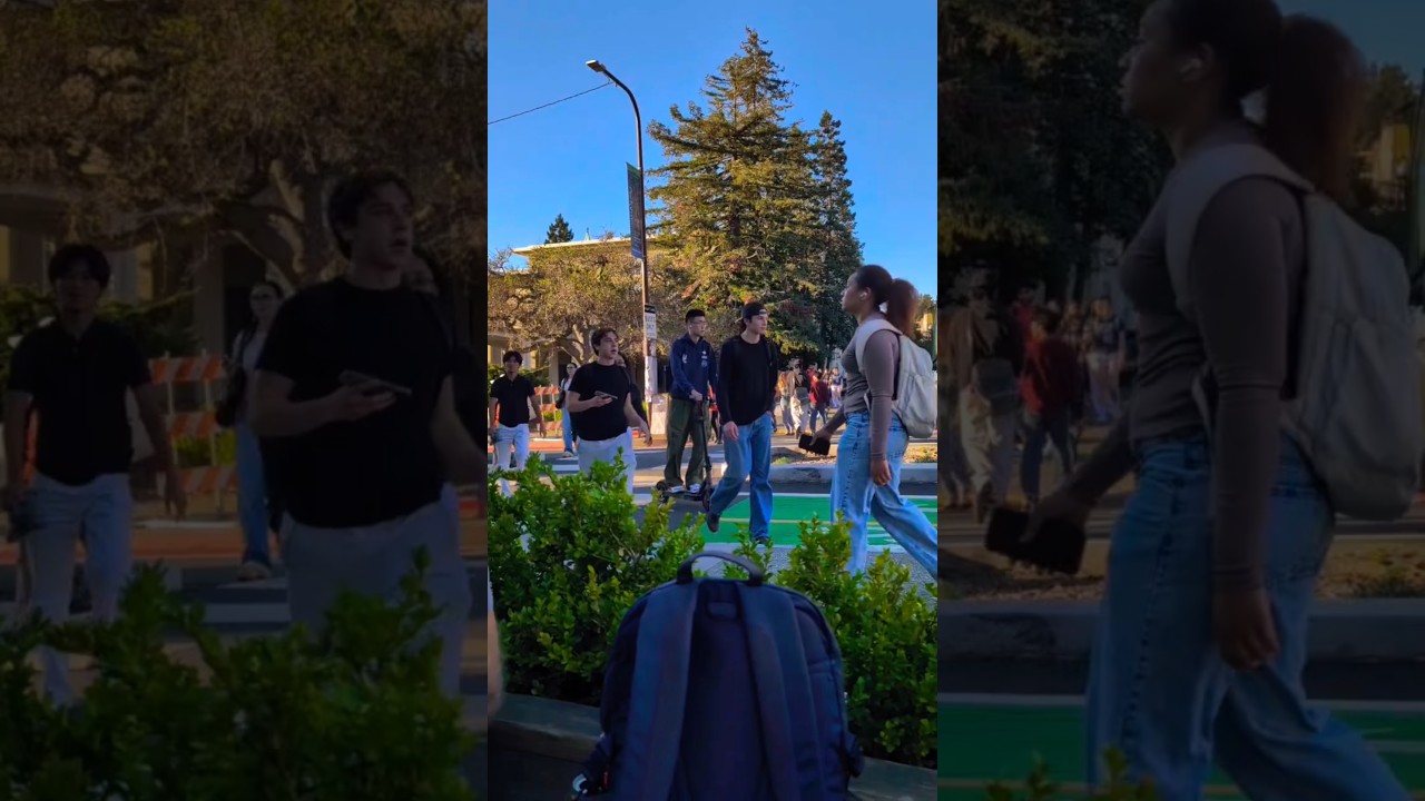 buses are stuck in traffic as students crossing the road for 13 minutes I'm UC berkeley California