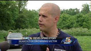Crews return to river in search of missing swimmer