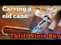 Carving a old cane from the thrift store.