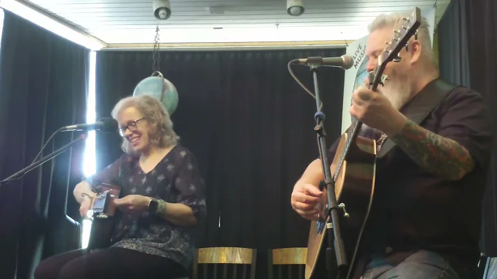 Claudia Gibson with Michael O'Connor at NeWorlDeli...