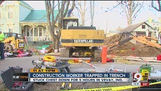 Construction worker trapped in trench