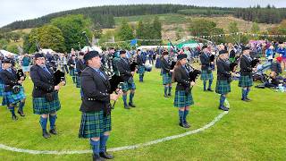 Drum Major Leads Towie Pipe Band On The March Starting Display At 2024 Lonach Gathering & Games