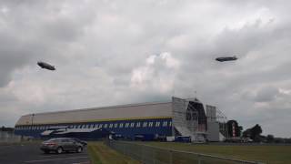 Two Goodyear Zeppelin NT's fly over Wingfoot Lake Hangar
