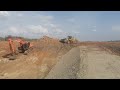 Lovol FL 966 wheel loader working on an operational dam.