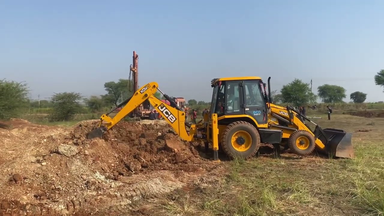 New JCB 3DX Eco Expert JCB loading soil into its dozer to make space for brick kiln machine | 