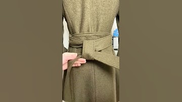 Life hack.  How beautiful to tie a belt on a coat.