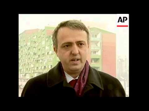 Mourners Signing Book Of Condolences Grave Site Being Prepared 