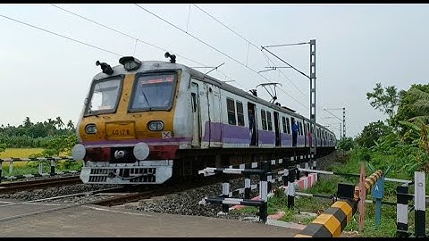Aerodynamic EMU Local Train Dangerous & Furious Moving Throughout Railgate
